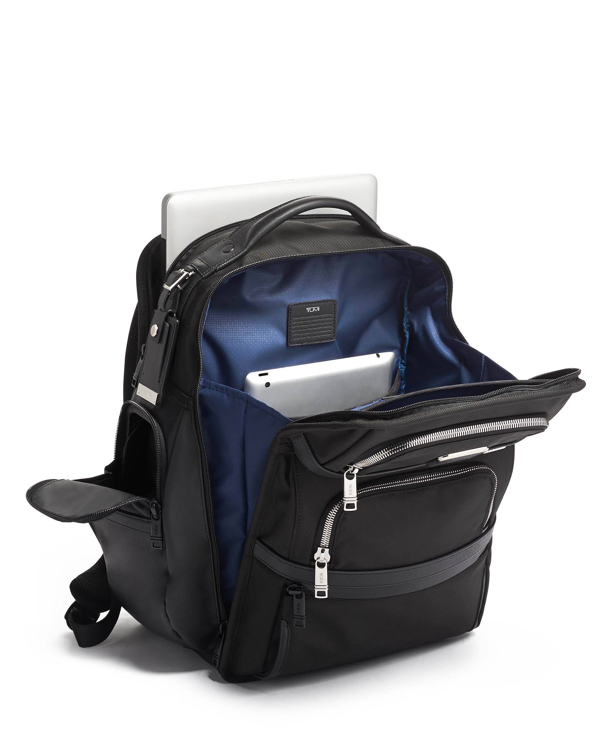 tumi backpack women price