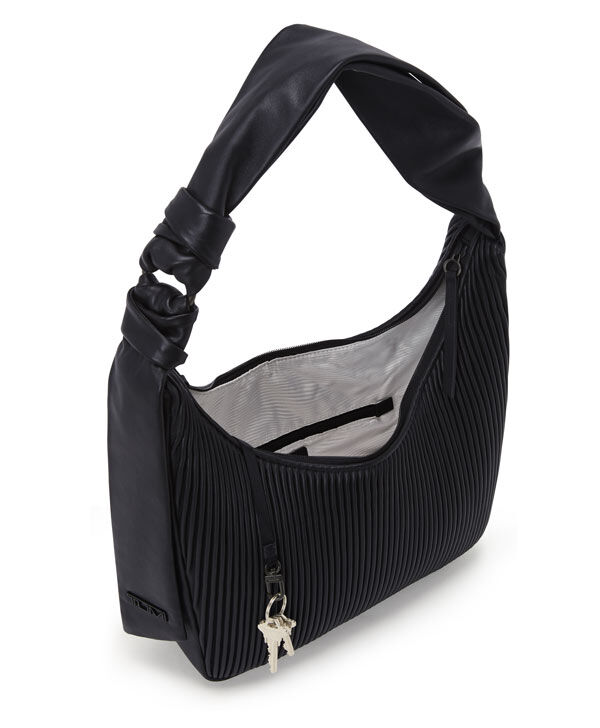 Tumi travel purse 2025